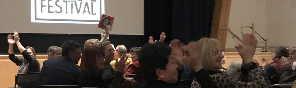 An audience applauds volunteers at the Sebastopol Documentary Film Festival. Celebrating the volunteers that bring its programs to life is among the principle purposes of the upcoming SebArts Open House, which will also include a shorts block and filmmaker discussion.